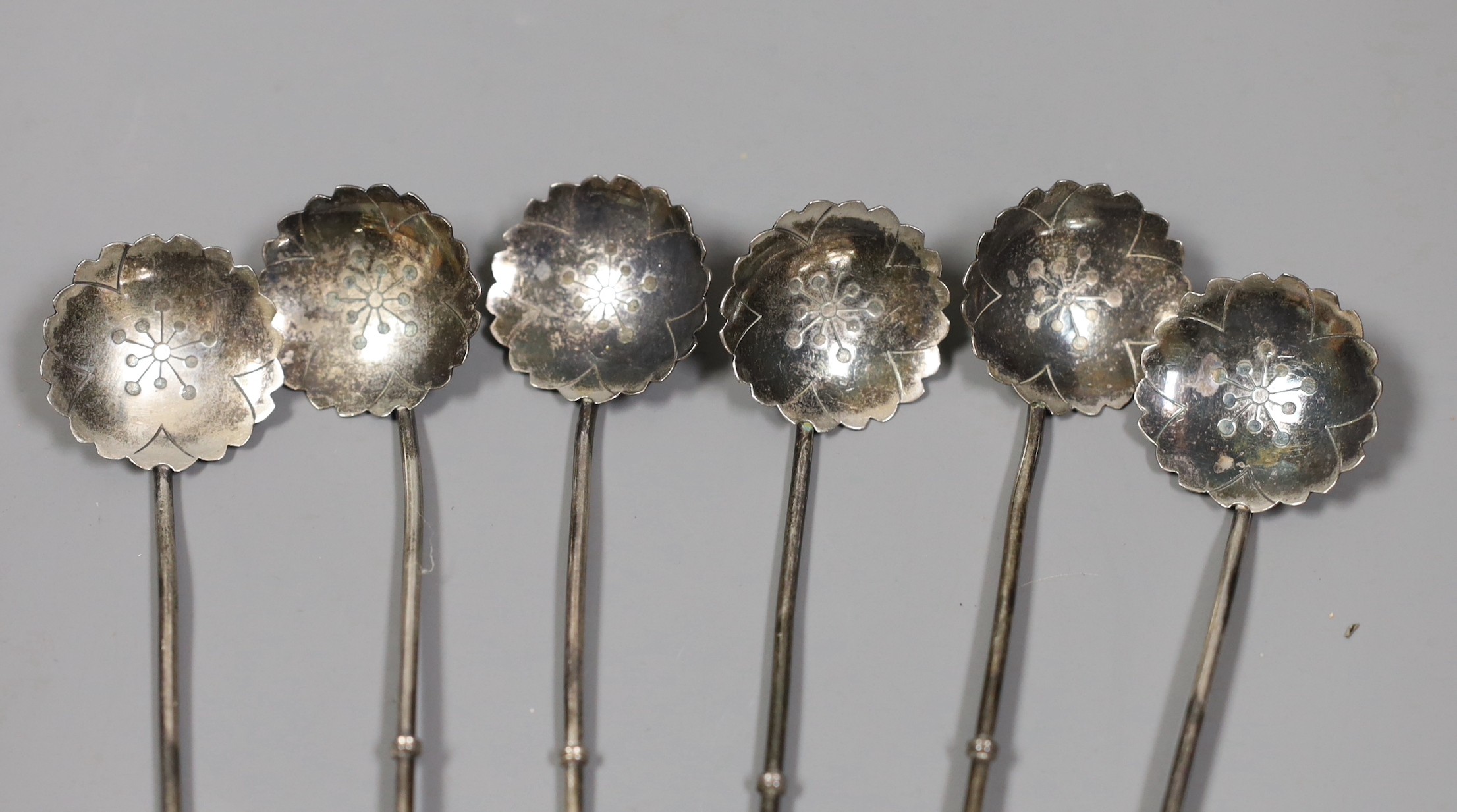 A set of six Japanese sterling iced teaspoons, 19.5cm, with differing terminals, 48 grams.